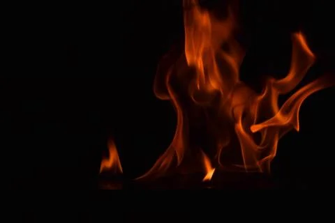 Fire flames on black background Stock Photos