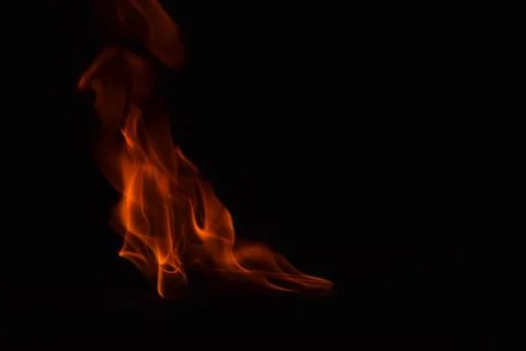 Fire flames on black background Stock Photos