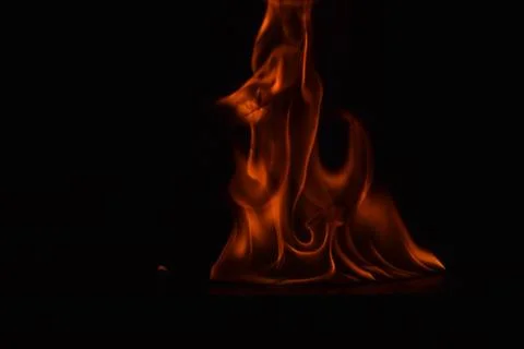 Fire flames on black background Stock Photos
