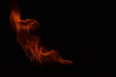 Fire flames on black background Stock Photos