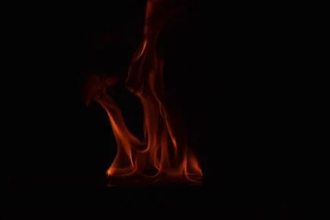 Fire flames on black background Stock Photos