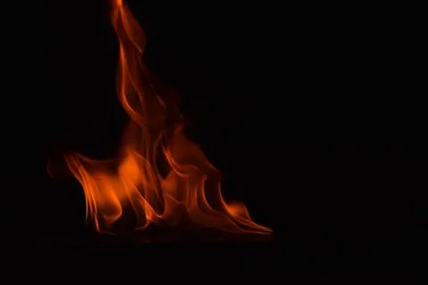 Fire flames on black background Stock Photos