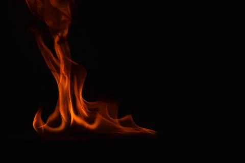 Fire flames on black background Stock Photos