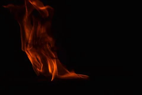 Fire flames on black background Stock Photos