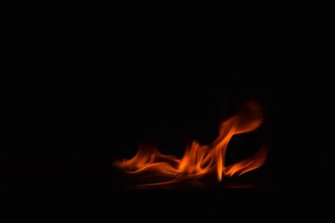 Fire flames on black background Stock Photos