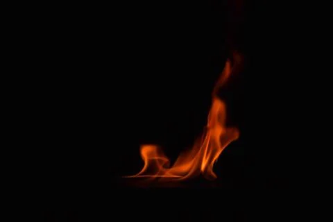 Fire flames on black background Stock Photos