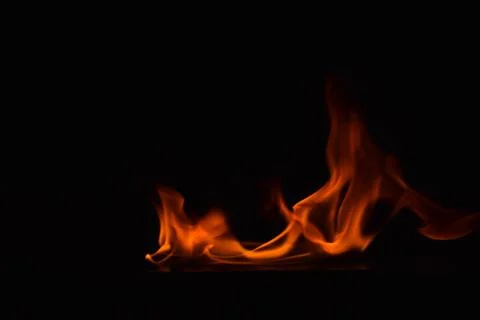Fire flames on black background Stock Photos