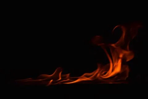 Fire flames on black background 스톡 사진