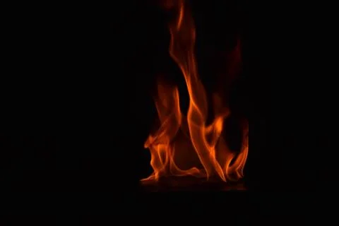 Fire flames on black background Stock Photos