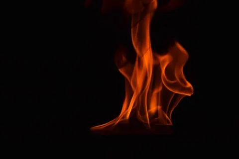 Fire flames on black background Stock Photos