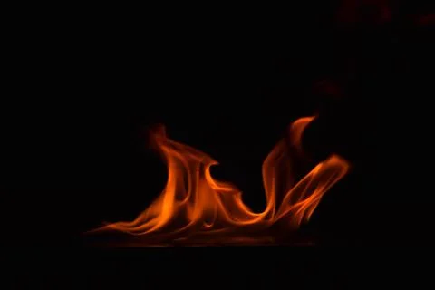 Fire flames on black background Stock Photos