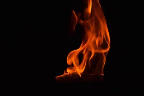Fire flames on black background Stock Photos