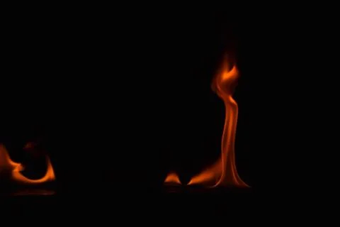 Fire flames on black background Stock Photos