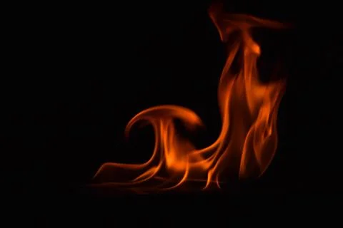 Fire flames on black background Stock Photos