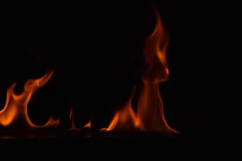 Fire flames on black background Stock Photos
