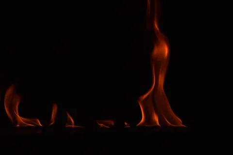 Fire flames on black background Stock Photos