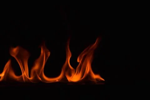 Fire flames on black background Stock Photos