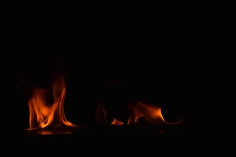 Fire flames on black background Stock Photos