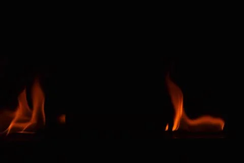 Fire flames on black background Stock Photos