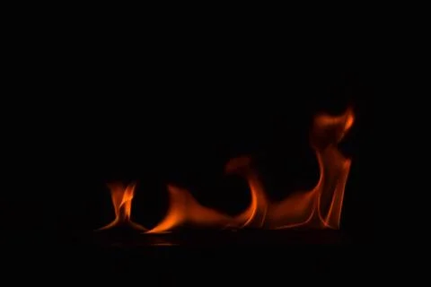 Fire flames on black background Stock Photos