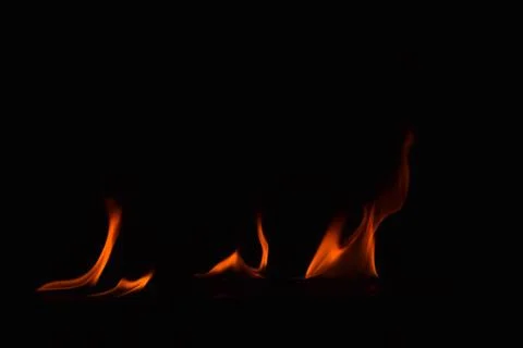 Fire flames on black background Stock Photos