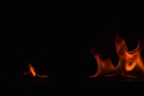 Fire flames on black background Stock Photos