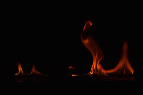Fire flames on black background Stock Photos