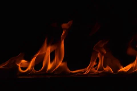 Fire flames on black background Stock Photos