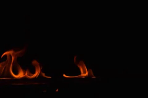 Fire flames on black background Stock Photos