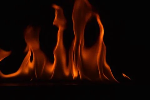 Fire flames on black background Stock Photos