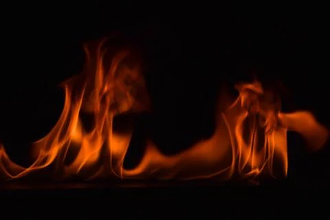 Fire flames on black background Stock Photos