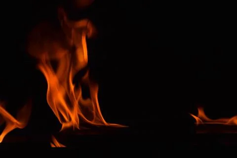 Fire flames on black background Stock Photos
