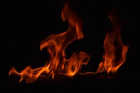 Fire flames on black background Stock Photos