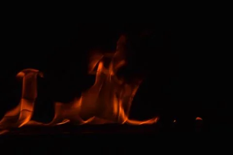 Fire flames on black background Stock Photos