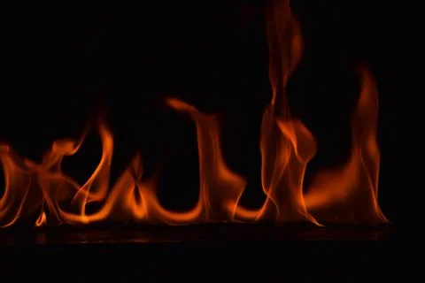 Fire flames on black background Stock Photos