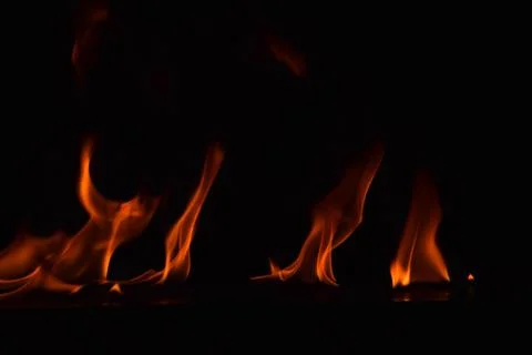 Fire flames on black background Stock Photos