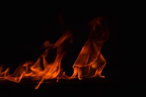 Fire flames on black background Stock Photos