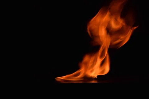 Fire flames on black background Stock Photos