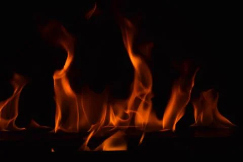 Fire flames on black background Stock Photos