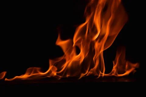 Fire flames on black background Stock Photos