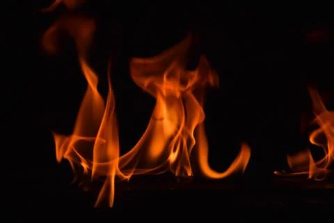 Fire flames on black background Stock Photos