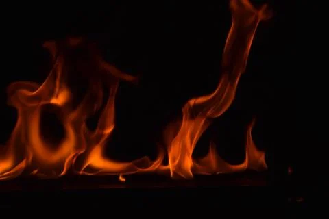 Fire flames on black background Stock Photos