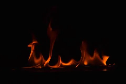 Fire flames on black background Stock Photos
