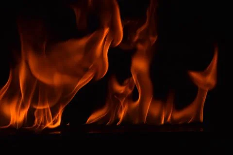Fire flames on black background Stock Photos