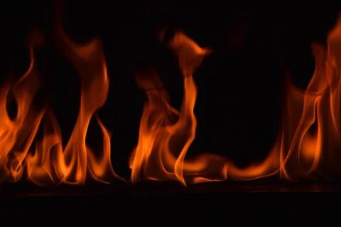 Fire flames on black background Stock Photos