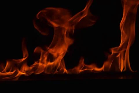 Fire flames on black background Stock Photos