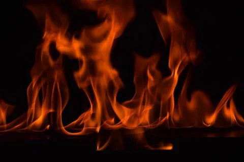 Fire flames on black background 스톡 사진