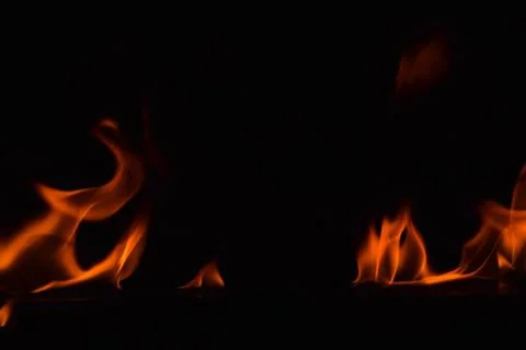 Fire flames on black background Stock Photos