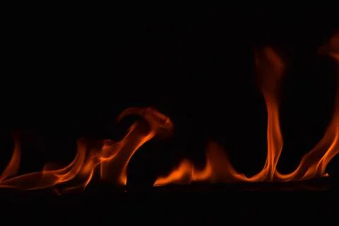 Fire flames on black background Stock Photos