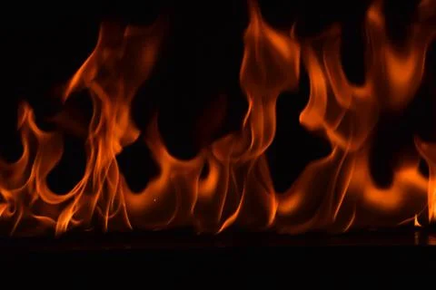 Fire flames on black background Stock Photos